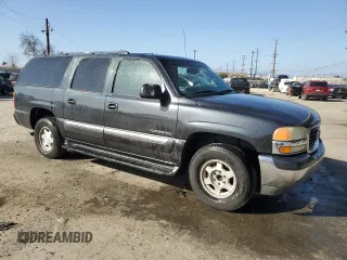 2003 GMC Yukon XL SLT with VIN 1GKEC16T43J329372, listed as a Copart auction lot 47852265 with 300,437 mi miles and Salvage Title. Bid and sale history available at carsss.com. Image 4.