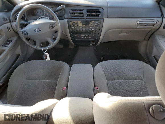 2002 Ford Taurus z VIN 1FAHP59S82A188995, wystawiony jako Copart lot #82141704 z przebiegiem 89 153 mil mil oraz Szkody całkowita. Historia ofert i sprzedaży dostępna na DreamBid. Obrazek 8.