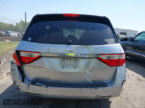 2011 Honda Odyssey EX-L with VIN 5FNRL5H62BB075789, listed as a IAAI auction lot 42035746 with 238,616 mi miles and . Bid and sale history available at carsss.com. Image 16.