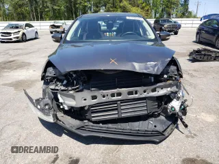 2016 Ford Focus Titanium with VIN 1FADP3N27GL201482, listed as a Copart auction lot 51768335 with 54,463 mi miles and Salvage title. Bid and sale history available at DreamBid. Image 5.
