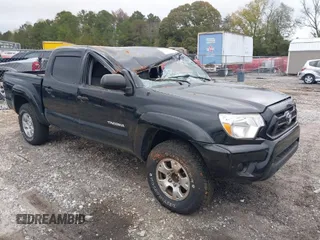 2013 Toyota Tacoma PreRunner z VIN 5TFJX4GN5DX022498, wystawiony jako IAAI lot #40809529 z przebiegiem 155 129 mil mil oraz . Historia ofert i sprzedaży dostępna na DreamBid. Obrazek 1.