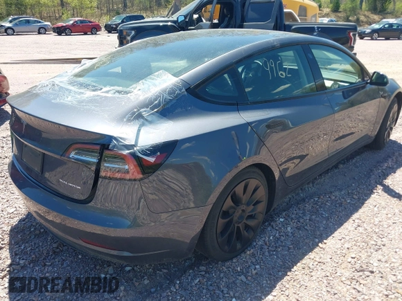 2022 Tesla Model 3 Long Range z VIN 5YJ3E1EB6NF260118, wystawiony jako IAAI lot #42139962 z przebiegiem 52 566 mil mil oraz . Historia ofert i sprzedaży dostępna na DreamBid. Obrazek 4.