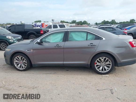 2014 Ford Taurus Limited with VIN 1FAHP2F81EG123902, listed as a IAAI auction lot 42345275 with 152,673 mi miles and . Bid and sale history available at DreamBid. Image 14.