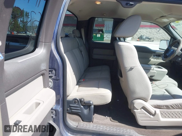 2009 Ford F-150 STX with VIN 1FTRX14889KB49041, listed as a IAAI auction lot 41925348 with 105,253 mi miles. Bid and sale history available at carsss.com. Image 8.