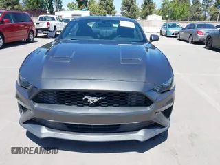 2018 Ford Mustang EcoBoost z VIN 1FA6P8TH1J5145175, wystawiony jako IAAI lot #42268107 z przebiegiem 97 211 mil mil oraz . Historia ofert i sprzedaży dostępna na DreamBid. Obrazek 12.