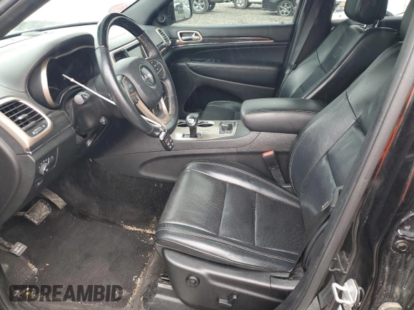 2015 Jeep Grand Cherokee Overland with VIN 1C4RJFCT2FC762573, listed as a Copart auction lot 59123275 with 229,128 mi miles and Salvage title. Bid and sale history available at DreamBid. Image 7.
