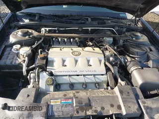 1999 Cadillac Eldorado Touring z VIN 1G6ET129XXU603042, wystawiony jako IAAI lot #41699955 z przebiegiem 81 704 mil mil oraz . Historia ofert i sprzedaży dostępna na DreamBid. Obrazek 10.
