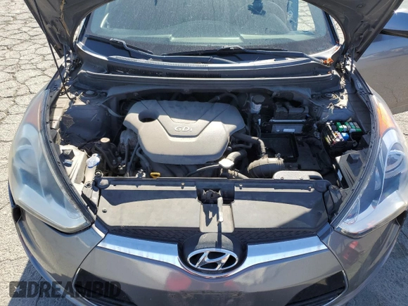 2012 Hyundai Veloster w/Gray Int z VIN KMHTC6AD9CU079542, wystawiony jako Copart lot #55998045 z przebiegiem 98 065 mil mil oraz Szkoda całkowita • Salvage title. Historia ofert i sprzedaży dostępna na DreamBid. Obrazek 11.