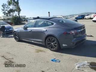 2015 Tesla Model S 85D with VIN 5YJSA1S2XFF092318, listed as a Copart auction lot 52026615 with 78,729 mi miles and Salvage Title. Bid and sale history available at carsss.com. Image 2.