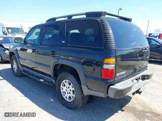2005 Chevrolet Tahoe Z71 with VIN 1GNEK13Z35R226575, listed as a IAAI auction lot 41991713 with 152,038 mi miles. Bid and sale history available at carsss.com. Image 3.