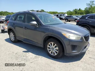 2014 Mazda CX-5 Sport with VIN JM3KE4BE6E0350595, listed as a Copart auction lot 61826475 with Not provided miles and Clean title. Bid and sale history available at DreamBid. Image 4.
