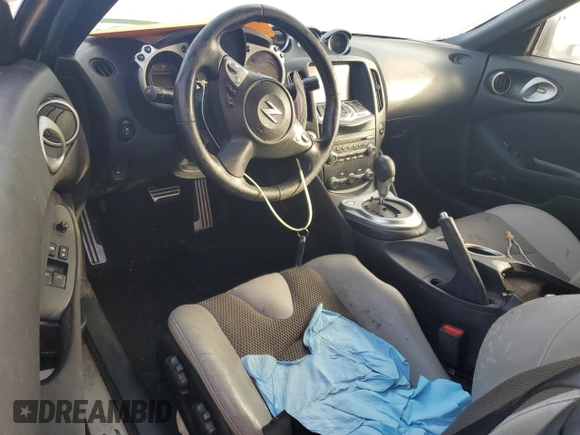 2014 Nissan 370Z Touring with VIN JN1AZ4FH8EM621259, listed as a Copart auction lot 77571454 with Not Provided miles and Salvage Title. Bid and sale history available at DreamBid. Image 8.