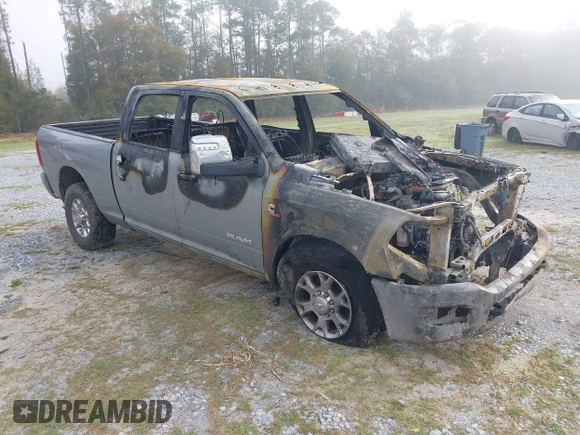 2023 Ram 2500 Laramie z VIN 3C6UR5FL7PG513099, wystawiony jako IAAI lot #41882148 z przebiegiem Nie podano mil oraz . Historia ofert i sprzedaży dostępna na DreamBid. Obrazek 1.