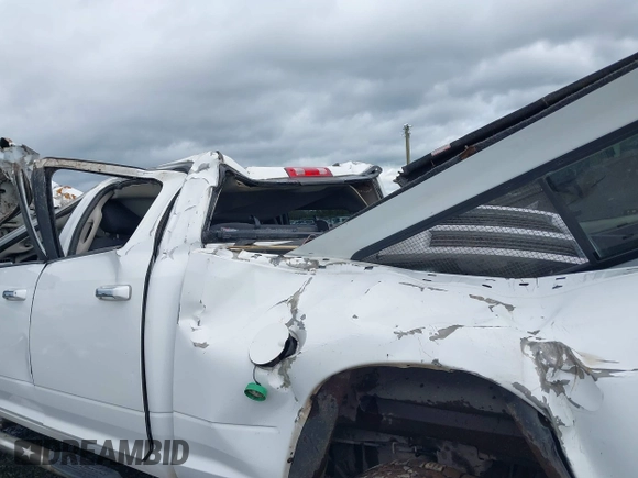 2011 Ram 2500 Laramie Longhorn with VIN 3D7UT2CL4BG589116, listed as a IAAI auction lot 41950008 with 132,282 mi miles and . Bid and sale history available at DreamBid. Image 13.