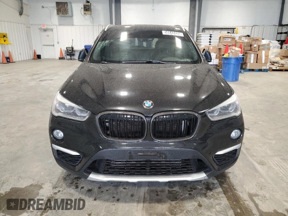 2017 BMW X1 xDrive28i with VIN WBXHT3Z39H4A51967, listed as a Copart auction lot 58843125 with 108,415 mi miles and Clean title. Bid and sale history available at DreamBid. Image 5.