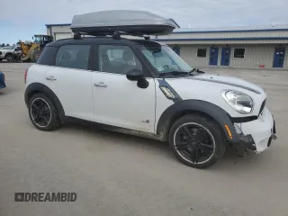 2012 MINI Countryman S with VIN WMWZC5C58CWM13141, listed as a Copart auction lot 48894185 with 128,291 mi miles and Salvage Title. Bid and sale history available at DreamBid. Image 4.