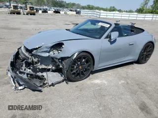 2023 Porsche 911 Carrera z VIN WP0CA2A9XPS238259, wystawiony jako Copart lot #53636345 z przebiegiem 14 328 mil mil oraz Szkoda całkowita • Salvage title. Historia ofert i sprzedaży dostępna na DreamBid. Obrazek 1.