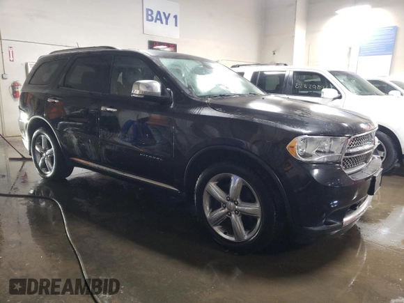 2012 Dodge Durango Citadel with VIN 1C4SDJET7CC183017, listed as a Copart auction lot 83441934 with 183,568 mi miles and Salvage Title. Bid and sale history available at DreamBid. Image 4.