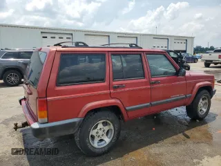 1999 Jeep Cherokee Sport with VIN 1J4FT68SXXL669549, listed as a Copart auction lot 62367015 with 194,446 mi miles and Salvage title. Bid and sale history available at DreamBid. Image 3.