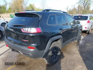 2022 Jeep Cherokee Trailhawk with VIN 1C4PJMBX1ND533715, listed as a IAAI auction lot 42041057 with 65,487 mi miles and . Bid and sale history available at DreamBid. Image 4.