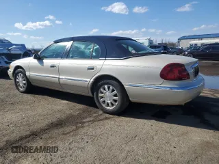 1999 Lincoln Continental with VIN 1LNHM97V1XY610090, listed as a Copart auction lot 50447685 with 105,375 mi miles and Clean Title. Bid and sale history available at DreamBid. Image 2.