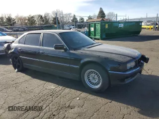 1999 BMW 7 Series 740il with VIN WBAGH833XXDP05481, listed as a Copart auction lot 85510534 with 159,680 mi miles and Salvage Title. Bid and sale history available at carsss.com. Image 4.