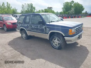 1991 Ford Explorer z VIN 1FMCU24X0MUA91155, wystawiony jako IAAI lot #42314856 z przebiegiem 75 836 mil mil oraz . Historia ofert i sprzedaży dostępna na DreamBid. Obrazek 1.