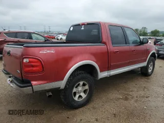 2001 Ford F-150 XLT with VIN 1FTRW08L41KB01407, listed as a Copart auction lot 59446555 with 285,312 mi miles and Salvage title. Bid and sale history available at DreamBid. Image 3.