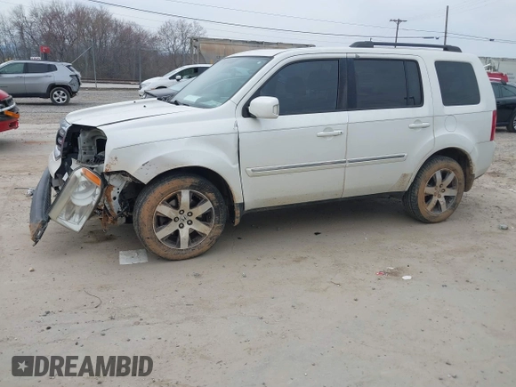 2013 Honda Pilot Touring with VIN 5FNYF3H98DB025516, listed as a IAAI auction lot 41767097 with 202,908 mi miles and . Bid and sale history available at DreamBid. Image 2.