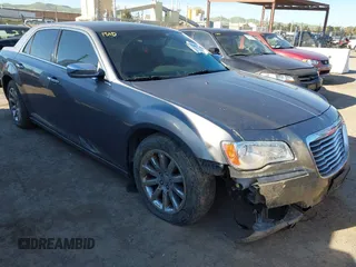 2011 Chrysler 300 Limited with VIN 2C3CA5CG5BH600936, listed as a IAAI auction lot 41885526 with 141,246 mi miles. Bid and sale history available at carsss.com. Image 1.