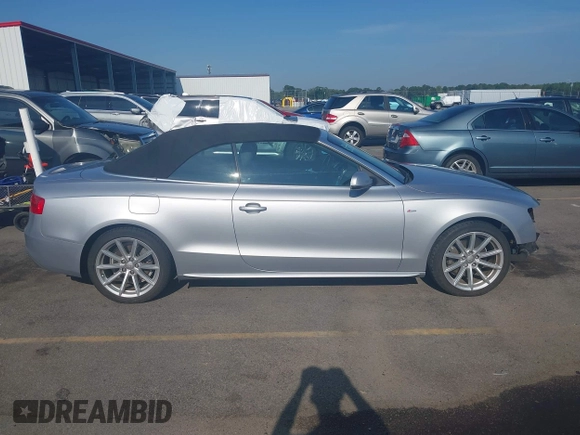 2016 Audi A5 Premium with VIN WAUD2AFHXGN005246, listed as a IAAI auction lot 42595647 with 56,602 mi miles and . Bid and sale history available at DreamBid. Image 14.