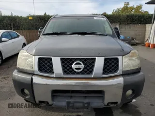 2005 Nissan Titan SE with VIN 1N6AA07B65N566082, listed as a Copart auction lot 80879174 with 215,297 mi miles and Clean Title. Bid and sale history available at carsss.com. Image 5.