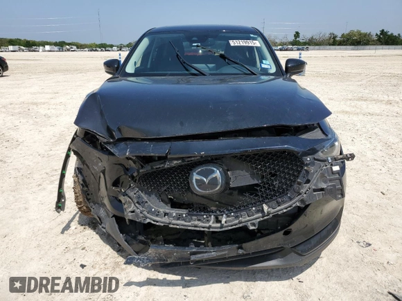 2021 Mazda CX-5 Grand Touring with VIN JM3KFADM5M0479247, listed as a Copart auction lot 51219915 with 33,384 mi miles and Salvage Title. Bid and sale history available at carsss.com. Image 5.