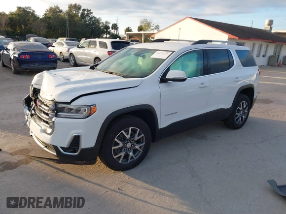 2023 GMC Acadia SLT with VIN 1GKKNMLS6PZ252439, listed as a IAAI auction lot 41277272 with 17,727 mi miles and . Bid and sale history available at DreamBid. Image 17.