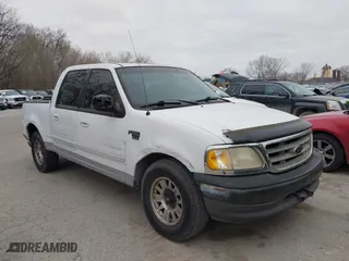 2001 Ford F-150 SuperCrew XLT with VIN 1FTRW07L61KB49220, listed as a IAAI auction lot 41826223 with 281,547 mi miles. Bid and sale history available at carsss.com. Image 1.