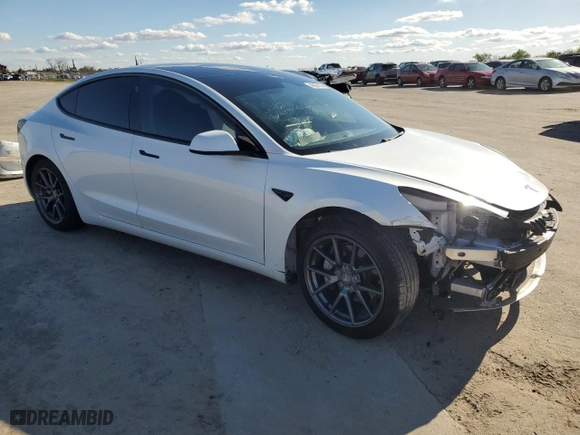 2021 Tesla Model 3 Standard Range Plus with VIN 5YJ3E1EA8MF074974, listed as a Copart auction lot 49626135 with 60,778 mi miles and Salvage Title. Bid and sale history available at carsss.com. Image 4.