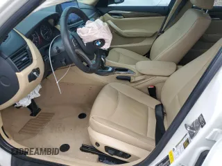 2014 BMW X1 sDrive28i z VIN WBAVM1C56EVW46769, wystawiony jako Copart lot #55341965 z przebiegiem 82 805 mil mil oraz Szkoda całkowita • Salvage title. Historia ofert i sprzedaży dostępna na DreamBid. Obrazek 7.