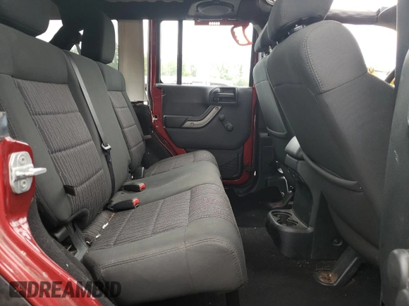 2012 Jeep Wrangler Unlimited Sport with VIN 1C4BJWDG6CL234419, listed as a Copart auction lot 62284825 with 66,649 mi miles and Salvage title. Bid and sale history available at DreamBid. Image 10.