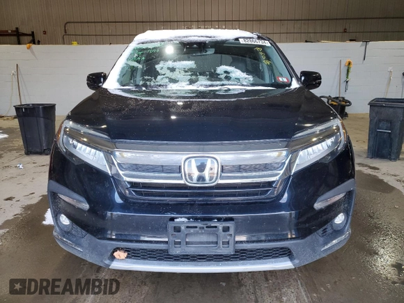 2021 Honda Pilot Elite with VIN 5FNYF6H05MB005324, listed as a Copart auction lot 82866734 with 126,630 mi miles and Salvage Title. Bid and sale history available at DreamBid. Image 5.