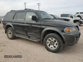 2000 Mitsubishi Montero Sport LS with VIN JA4LS31H9YP007670, listed as a Copart auction lot 86809344 with 239,106 mi miles and Salvage Title. Bid and sale history available at carsss.com. Image 4.