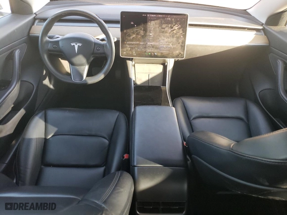 2020 Tesla Model 3 Standard Range Plus with VIN 5YJ3E1EA7LF803660, listed as a Copart auction lot 77394564 with 61,062 mi miles and Salvage Title. Bid and sale history available at carsss.com. Image 8.