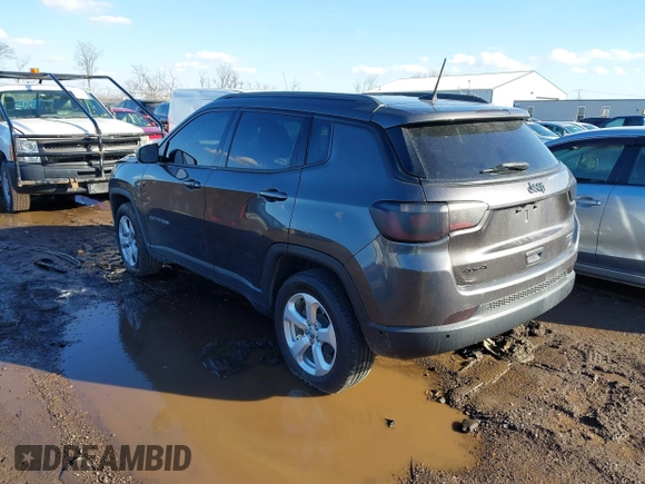 2019 Jeep Compass Latitude with VIN 3C4NJDBB4KT597331, listed as a IAAI auction lot 41664673 with 98,042 mi miles. Bid and sale history available at carsss.com. Image 3.