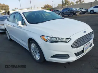 2016 Ford Fusion SE Hybrid z VIN 3FA6P0LU4GR144591, wystawiony jako IAAI lot #42592828 z przebiegiem 96 184 mil mil oraz . Historia ofert i sprzedaży dostępna na DreamBid. Obrazek 1.