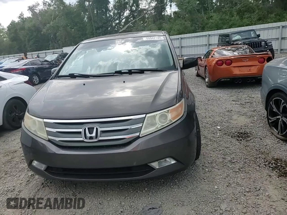 2012 Honda Odyssey Touring with VIN 5FNRL5H94CB102177, listed as a Copart auction lot 55942185 with 179,418 mi miles and Salvage Title. Bid and sale history available at DreamBid. Image 14.