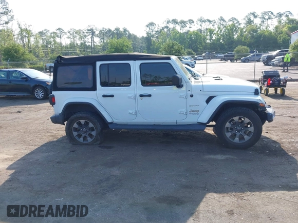 2018 Jeep Wrangler Unlimited Sahara z VIN 1C4HJXEG3JW175226, wystawiony jako IAAI lot #42307456 z przebiegiem 72 875 mil mil oraz . Historia ofert i sprzedaży dostępna na DreamBid. Obrazek 13.