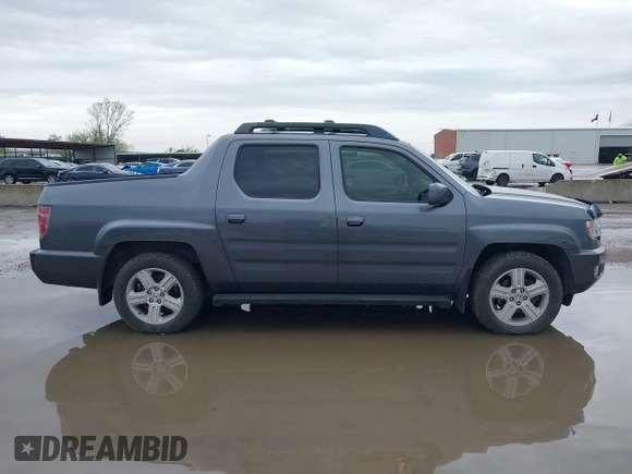 2014 Honda Ridgeline RTL with VIN 5FPYK1F50EB002577, listed as a IAAI auction lot 41931258 with 147,665 mi miles. Bid and sale history available at carsss.com. Image 13.