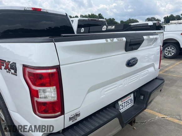 2018 Ford F-150 XL with VIN 1FTEW1E53JKC80985, listed as a IAAI auction lot 42568687 with 97,179 mi miles and . Bid and sale history available at DreamBid. Image 1.