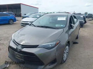 2018 Toyota Corolla L with VIN 2T1BURHE1JC983389, listed as a IAAI auction lot 42221142 with 79,113 mi miles and . Bid and sale history available at DreamBid. Image 17.