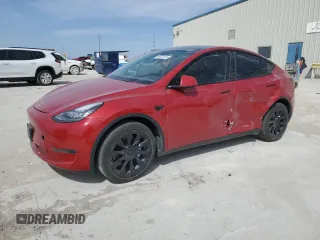 2023 Tesla Model Y Long Range z VIN 7SAYGDEE1PA024698, wystawiony jako Copart lot #49634145 z przebiegiem 31 632 mil mil oraz Szkoda całkowita • Salvage title. Historia ofert i sprzedaży dostępna na DreamBid. Obrazek 1.