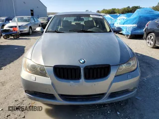 2006 BMW 3 Series 330i with VIN WBAVB33516KS37065, listed as a Copart auction lot 49379595 with Not Provided miles and Salvage Title. Bid and sale history available at DreamBid. Image 5.